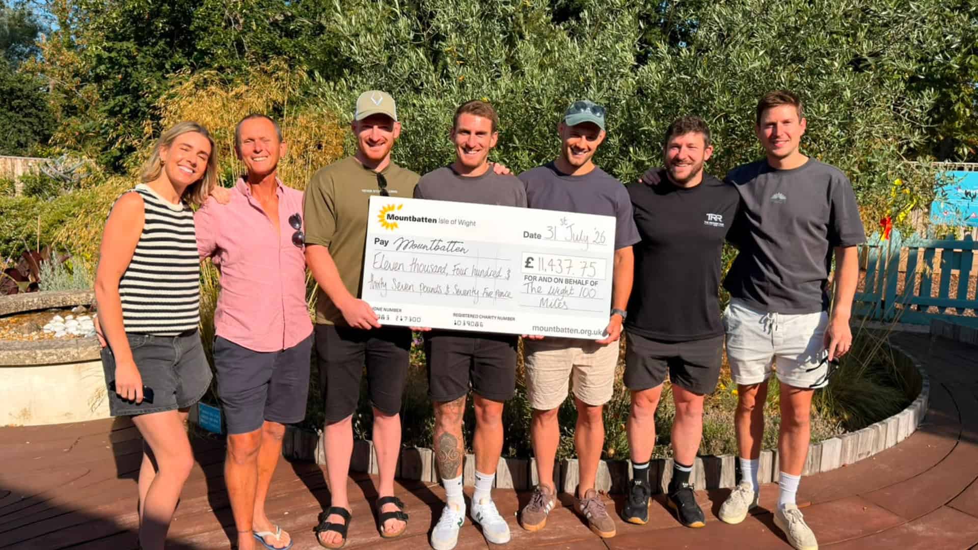 With a giant cheque at Mountbatten Isle of Wight Lotti Tyson, Paul Tyson, Aidan Price, Sam Tyson, Kemp Price, Sam Dawson and Charlie Smith