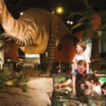 A family inside Dinosaur Isle