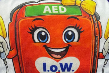 iw defibrillators logo on a cushion
