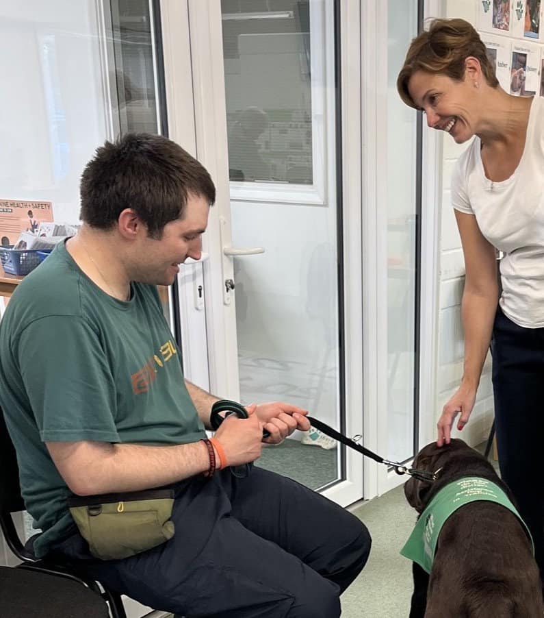 Katy talking to people at training session with their Ability dogs