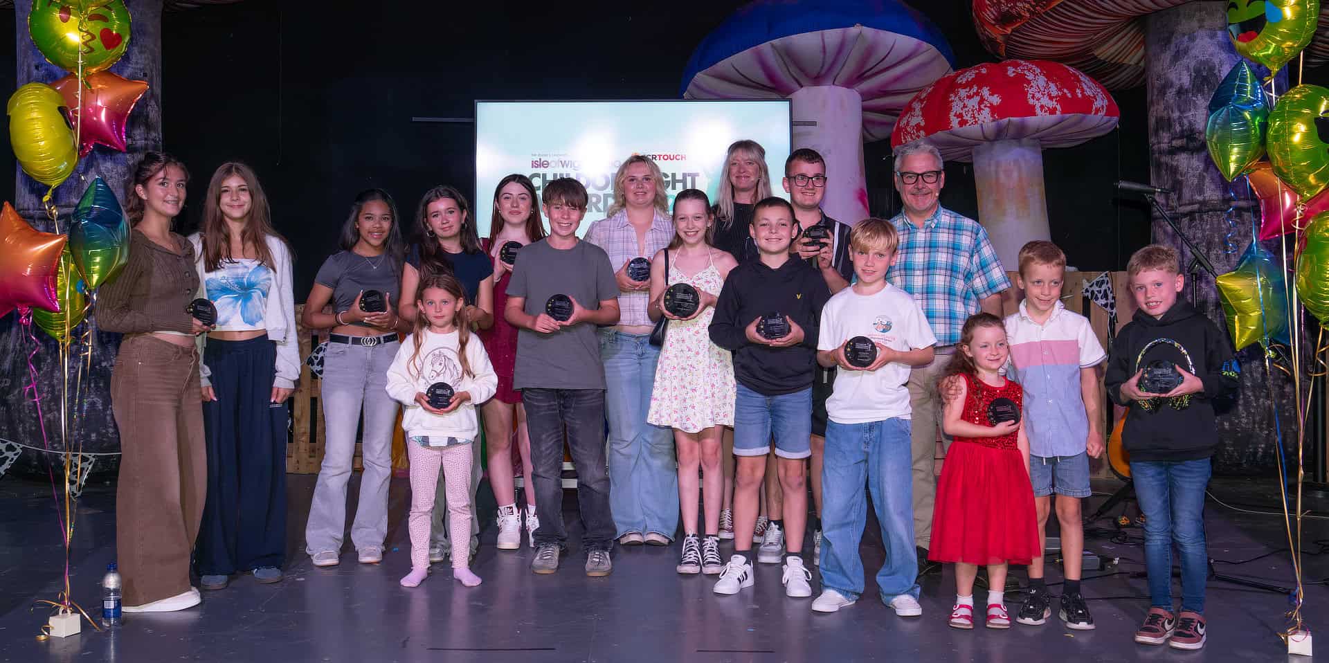 All Child of Wight winners on stage with their awards