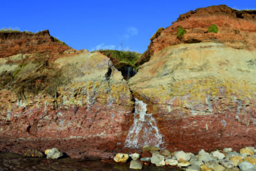 The different layers of rocks at Churchill's Chine in 2023