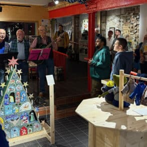 The opening night of the Common Place exhibition, with Brighstone Barnacles group singing shanties