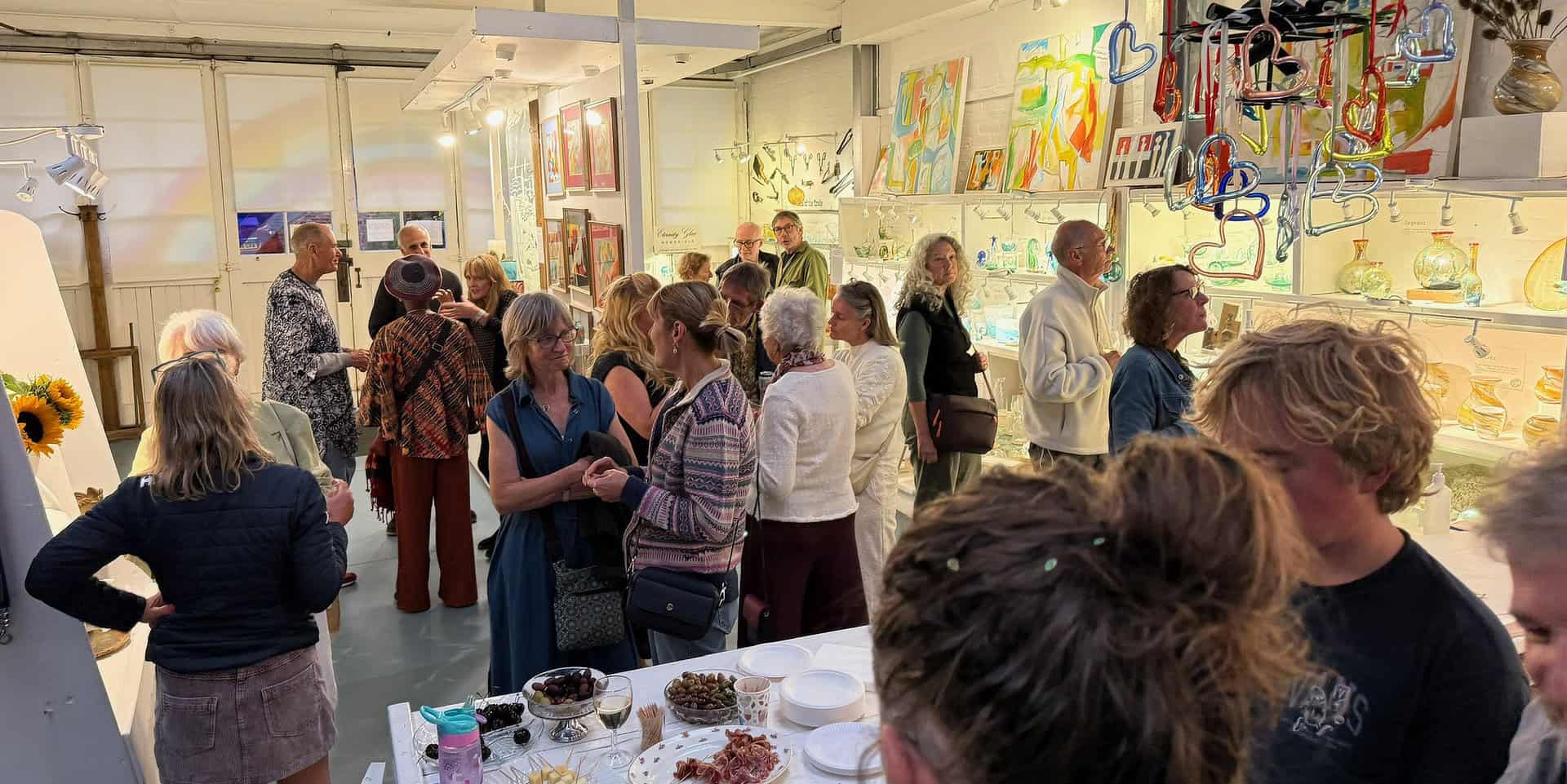 People attending the opening of the exhibition
