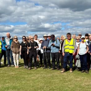 People attending the coastal path opening