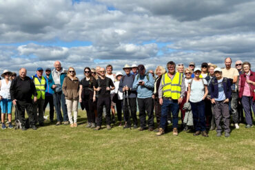 People attending the coastal path opening