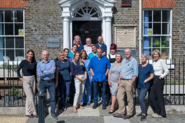 The Lighthouse Clinic staff outside the clinic
