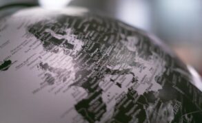 black and white photo of a world globe