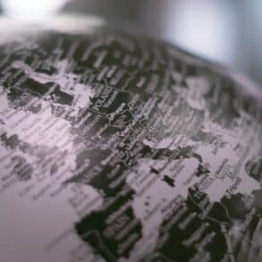 black and white photo of a world globe