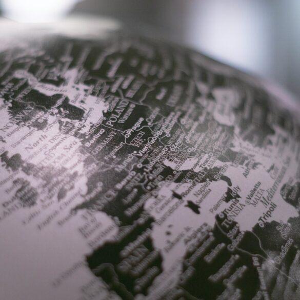 black and white photo of a world globe