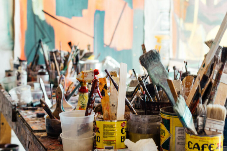 paint brushes in an artists studio