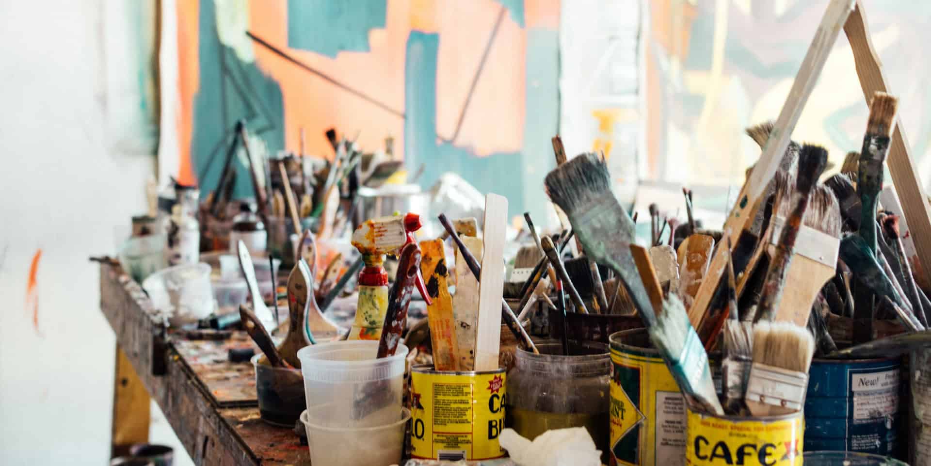paint brushes in an artists studio
