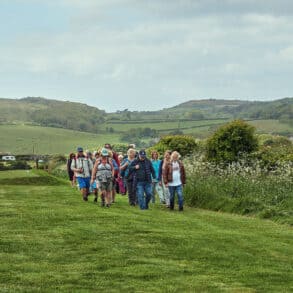 people walking across country