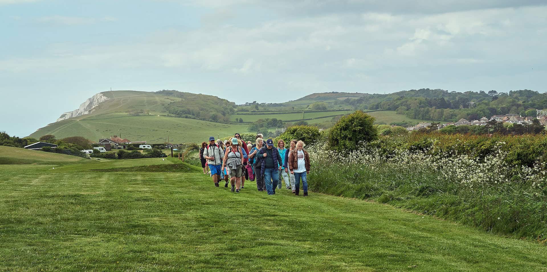 people walking across country