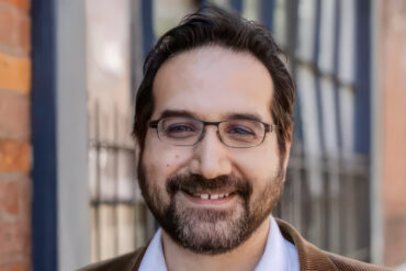 Professor Adam Amara