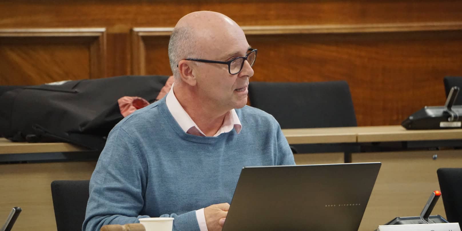 Andrew Garratt sitting in a council meeting