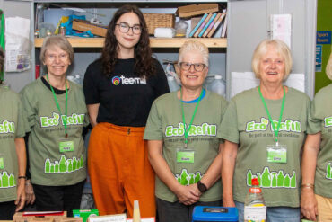 Eco Refill volunteers with Sara Debreceni from Teemill, showing off their new sponsored Eco Refill T shirts