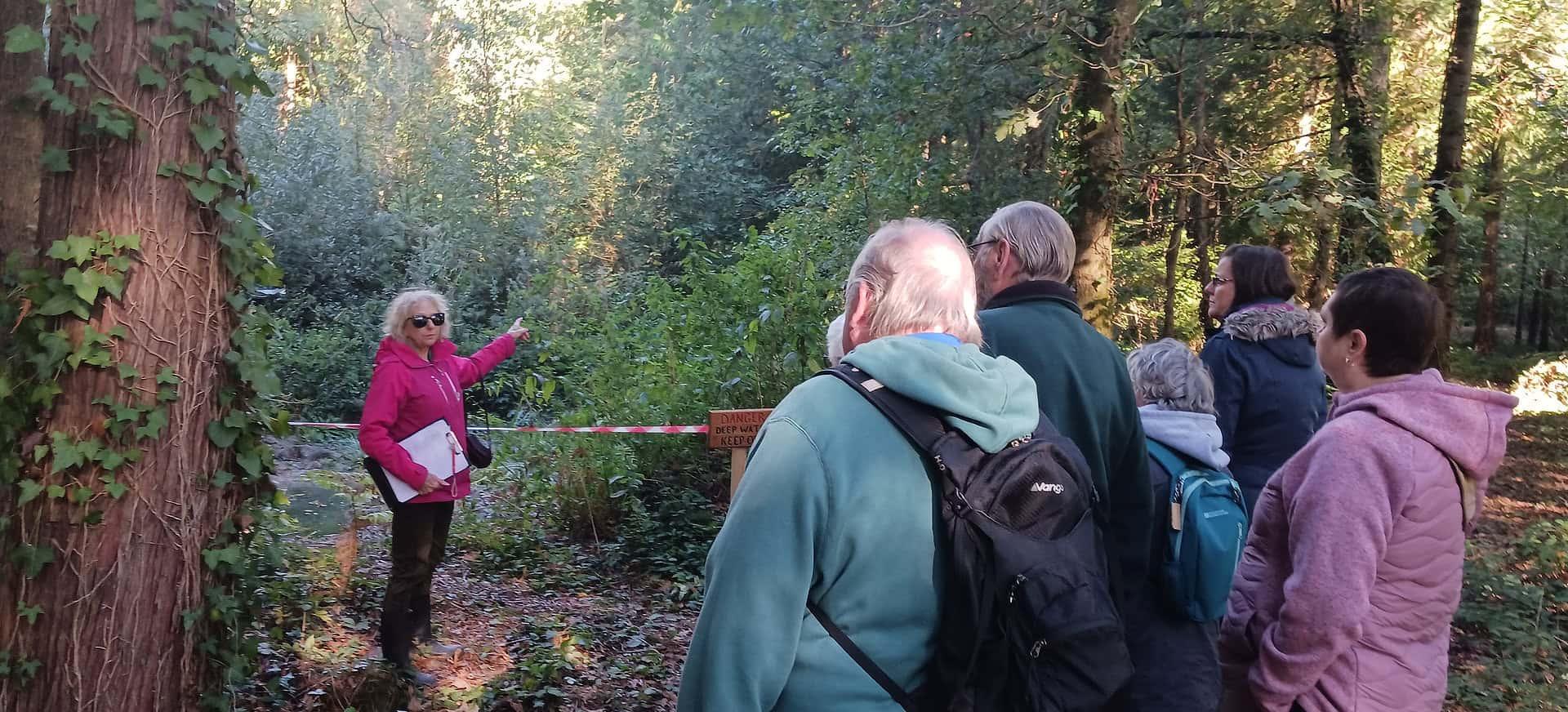 Howes Wood - public ballot visitors at the pond with Helen Butler, woodland manager