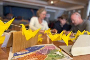People making origami cranes at Sandown Town of Culture day