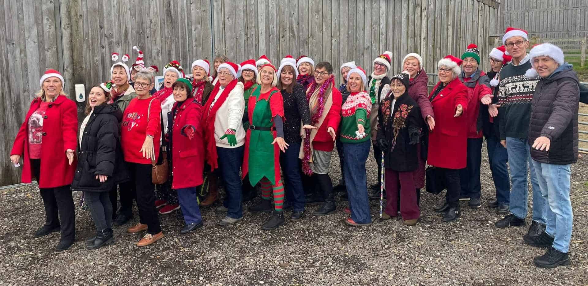 Members of the Melodic choir dressed in christmas outfits