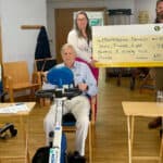 Charlotte Hornblow, Community Fundraising Lead (Group) at Mountbatten Isle of Wight (left) and John Heather, Senior Agent at NFU Mutual New Forest, Isle of Wight and Bournemouth (right)