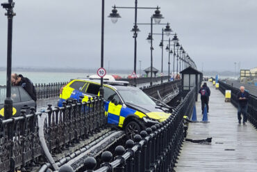 Police car in pier crash