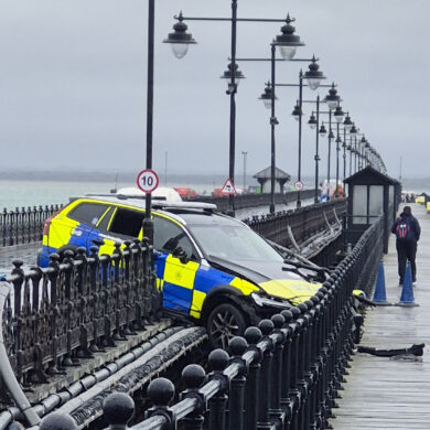 Police car in pier crash