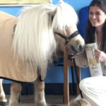Author Alice Goring with Teddy the Shetland Pony at Queensgate Primary School, East Cowes.