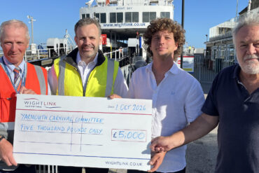 Giant cheque being presented by wightlink to the council