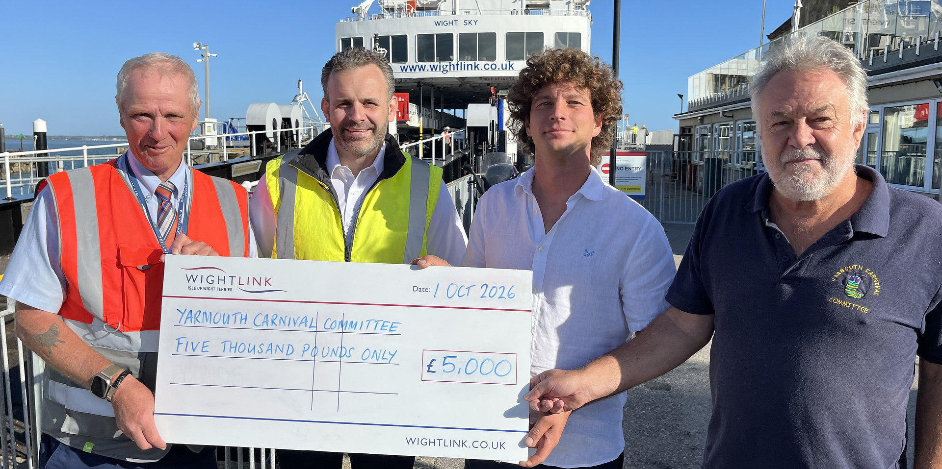 Giant cheque being presented by wightlink to the council