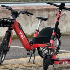 voi scooter and bike on the seafront