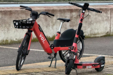 voi scooter and bike on the seafront